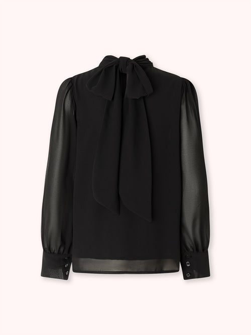 BLUSA DE CUELLO ALTO CON LAZADA NEGRA