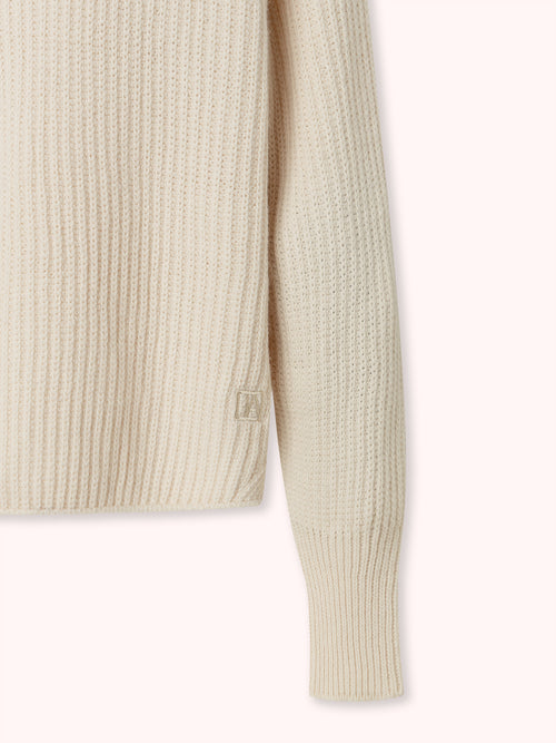 SUÉTER DE CUELLO ALTO BEIGE