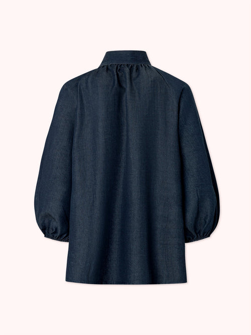 BLUSA MANGA ABULLONADA CON LAZO EN CUELLO DENIM AZUL MARINO