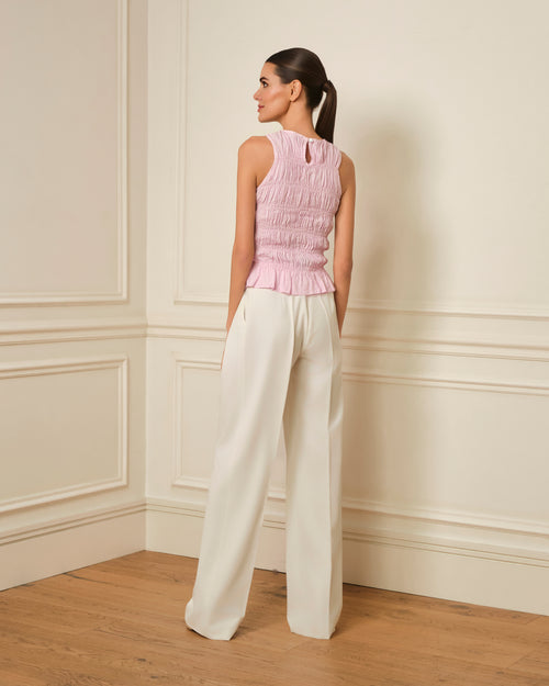 TOP FRUNCIDO SIN MANGAS ROSA