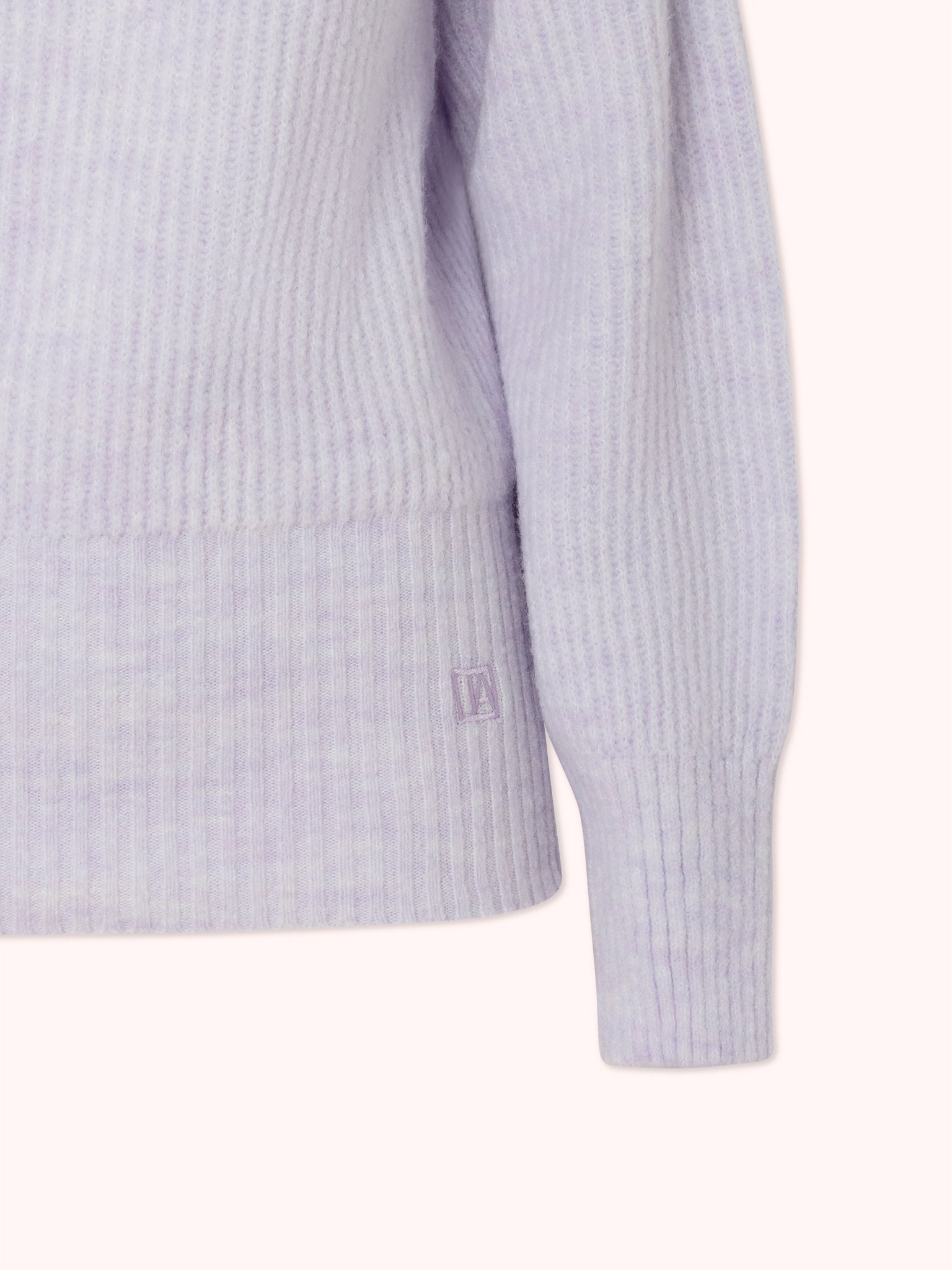 SUÉTER DE PUNTO CANALÉ CON MANGA ABULLONADA LAVANDA