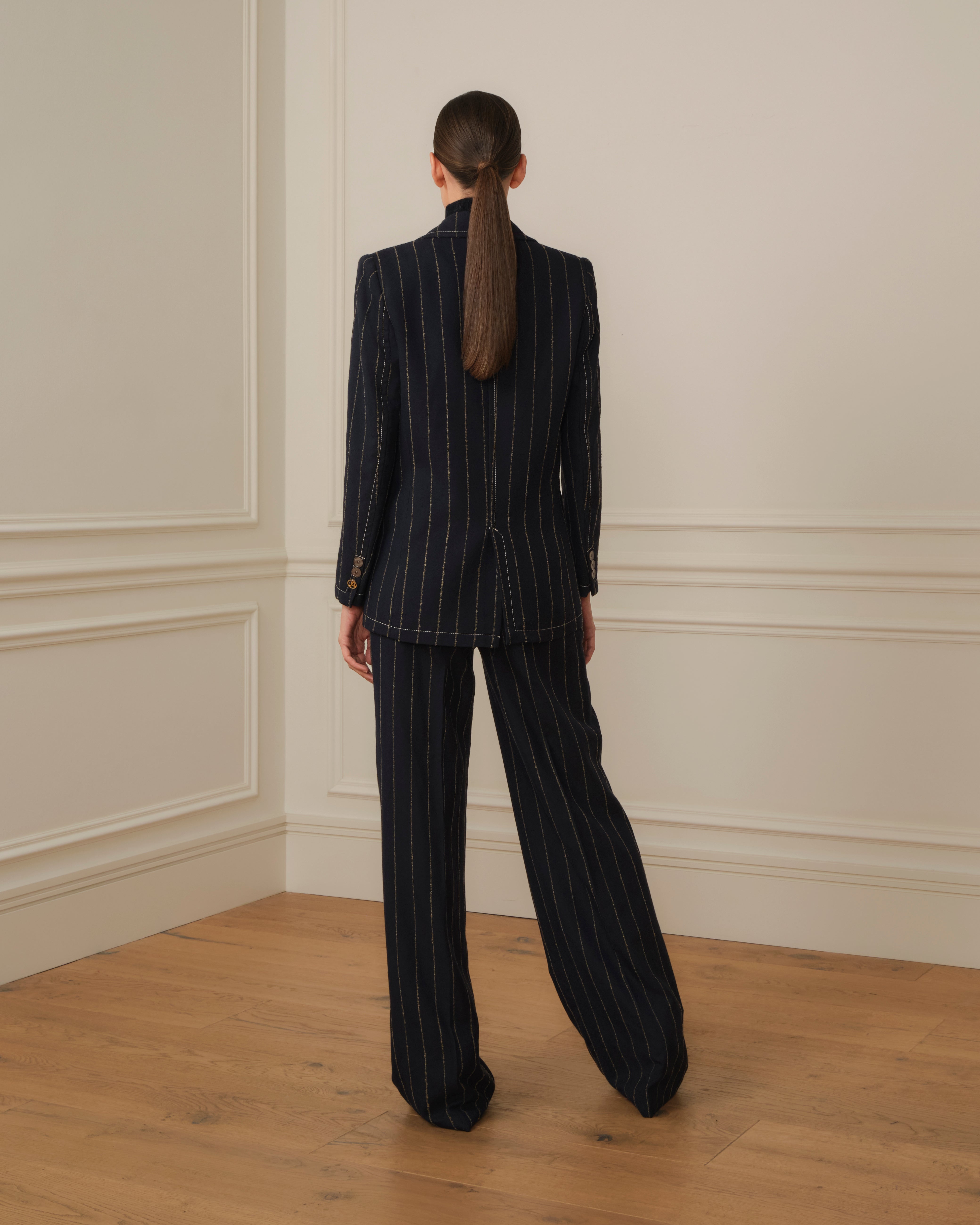 PANTALÓN PALAZZO CON PINZAS DE RAYAS