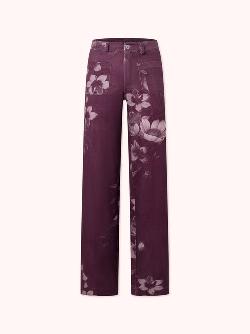 PANTALÓN FLARE CON ESTAMPADO FLORAL MORADO