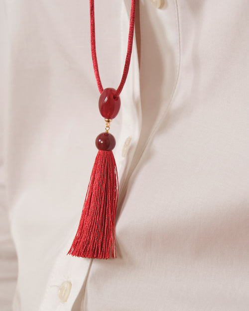 COLLAR CON FLECOS ROJO