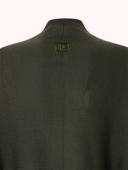 CAPA DE PUNTO FINO CON FLECOS VERDE