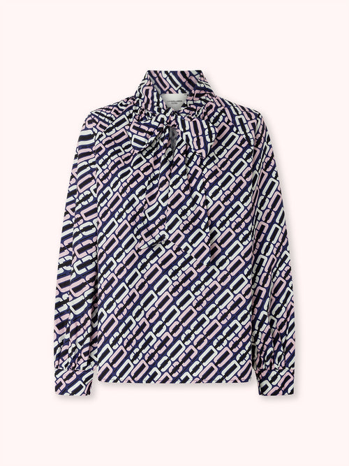 BLUSA MANGA ABULLONADA CON ESTAMPADO