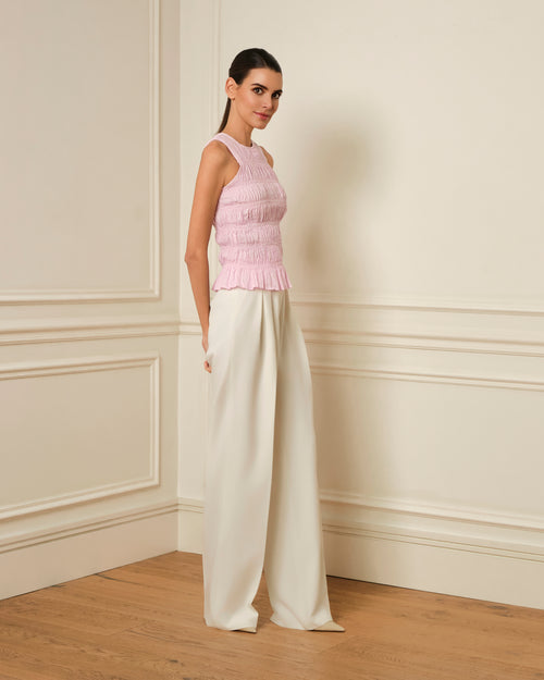 TOP FRUNCIDO SIN MANGAS ROSA