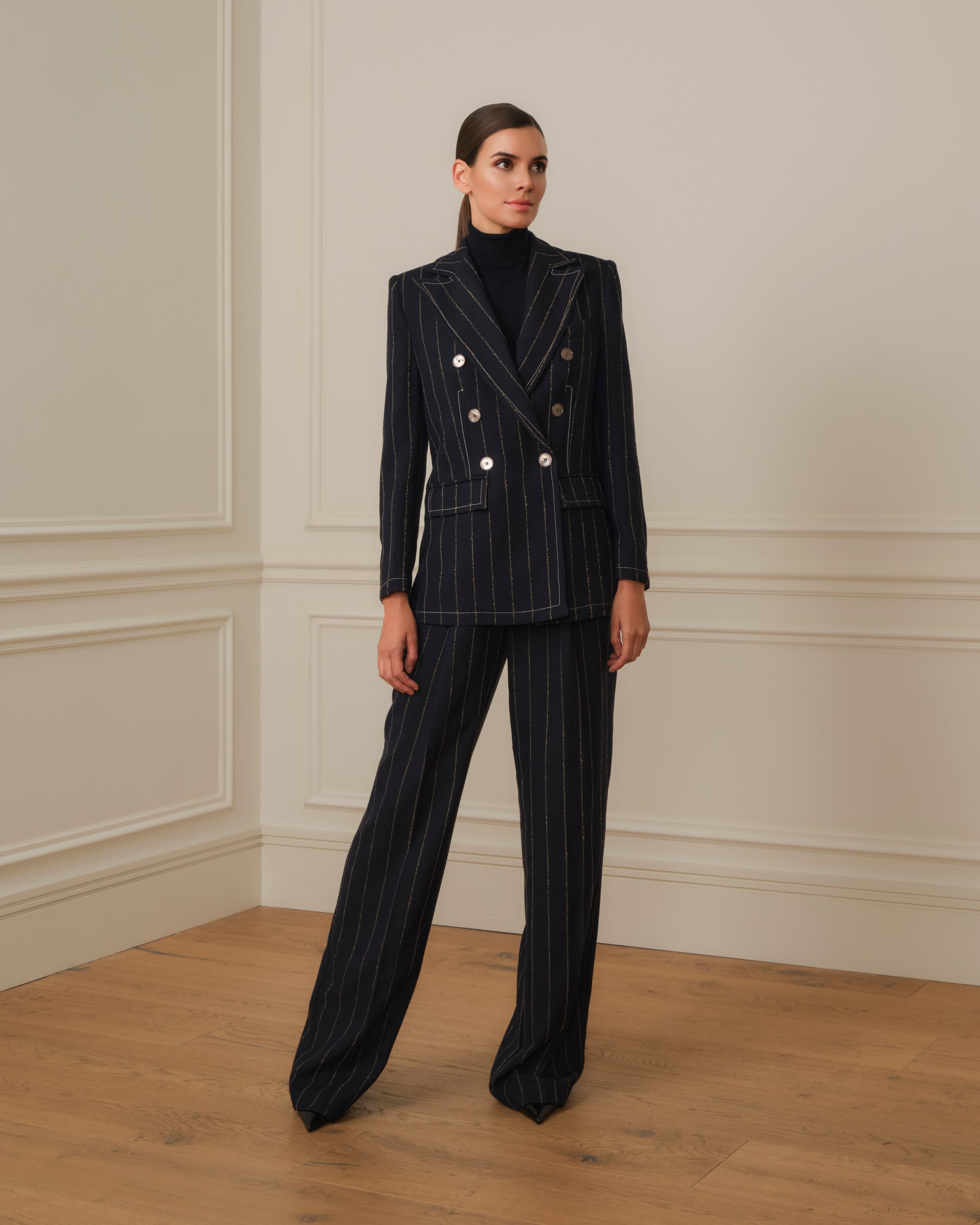 PANTALÓN PALAZZO CON PINZAS DE RAYAS